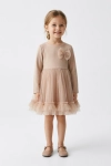 Feestjurk Iga in beige met lange mouwen en tulestrikje – volledige look, vooraanzicht