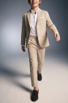 Beige feestpak Liam voor jongens – open colbert en broek, in beweging, vooraanzicht